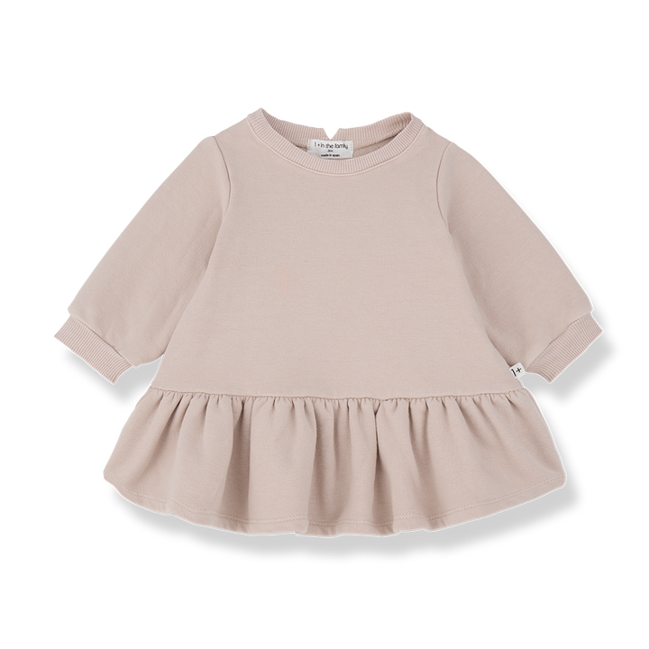 Rosafarbenes Kleid für Babys und Kleinkinder mit langen Ärmeln aus 98% Baumwolle und 2% Elasthan (Softfleece) im Sweatshirt-Look. Ausgestellter Rock ab der Hüfte. Produktbild, Ansicht von vorne.