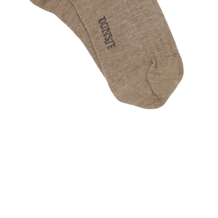 Donsje Bell Socks Bear dusty green Detailaufnahme Sohle des Strumpfes mit eingewebtem Logo von Donsje