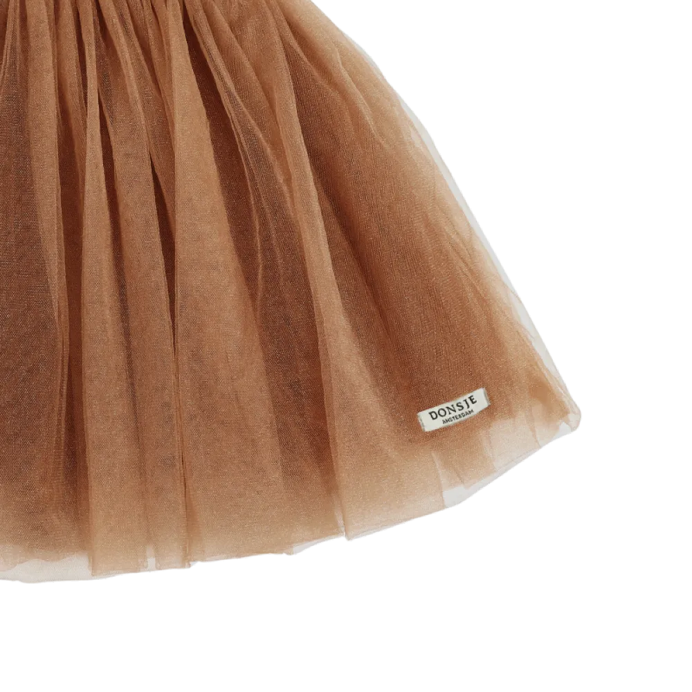 Donsje Pien Skirt hazelnut Detailaufnahme Saum mit Blick auf das angenähte Label von Donsje 