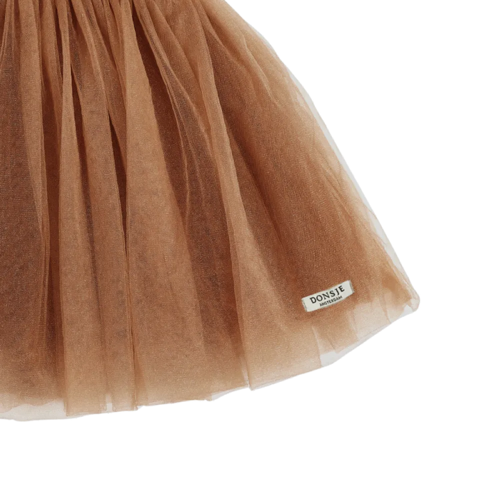 Donsje Pien Skirt hazelnut Detailaufnahme Saum mit Blick auf das angenähte Label von Donsje 