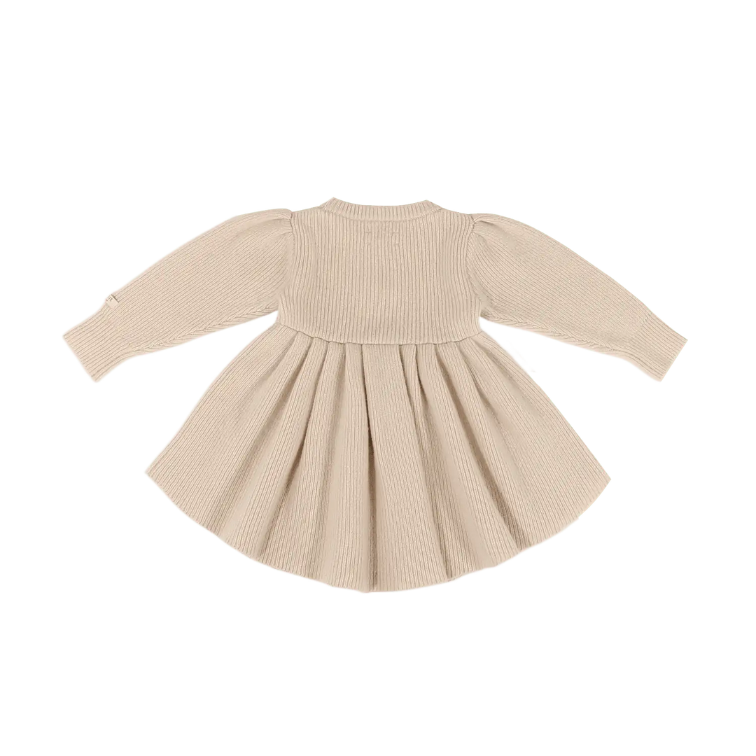 Donsje Vikkie Merino Wool Dess Fluffy Bunny Soft Sand Produktbild, Ansicht der Rückseite.