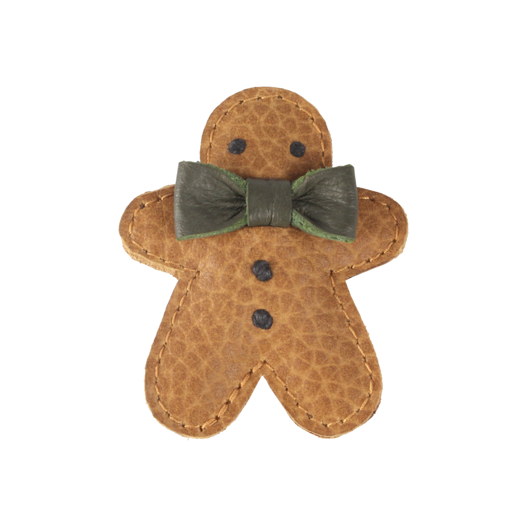 Klammer für Kinder für die Kleidung oder die Haare aus Leder in Form eines Lebkuchenmannes