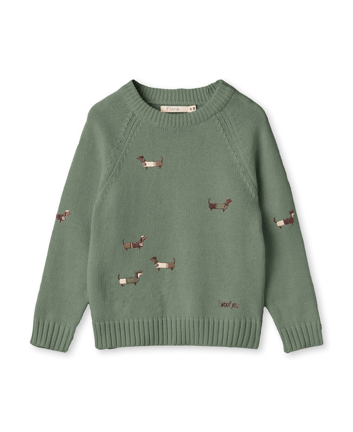 grüner Strickpullover für Babys und Kleinkinder aus Bio-Baumwolle Ansicht von vorne mit sieben aufgestickten Dackeln und mit Rundhalsausschnitt