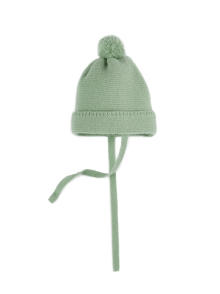 Bommelmütze für Babys aus Merinowolle und Kaschmir in hellgrün mit Bindeband