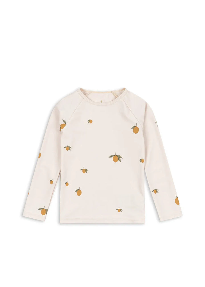 cremefarbenes UV-Shirt für Babys und Kinder mit langen Ärmeln, Rundhalsausschnitt und Zitronen-Allover-Print