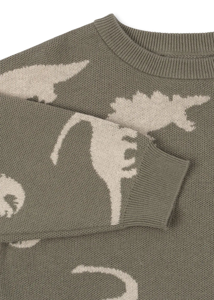 Konges Sloejd Lapis Strcikpullover dino Nahaufnahme Ausschnitt und Dino-Muster