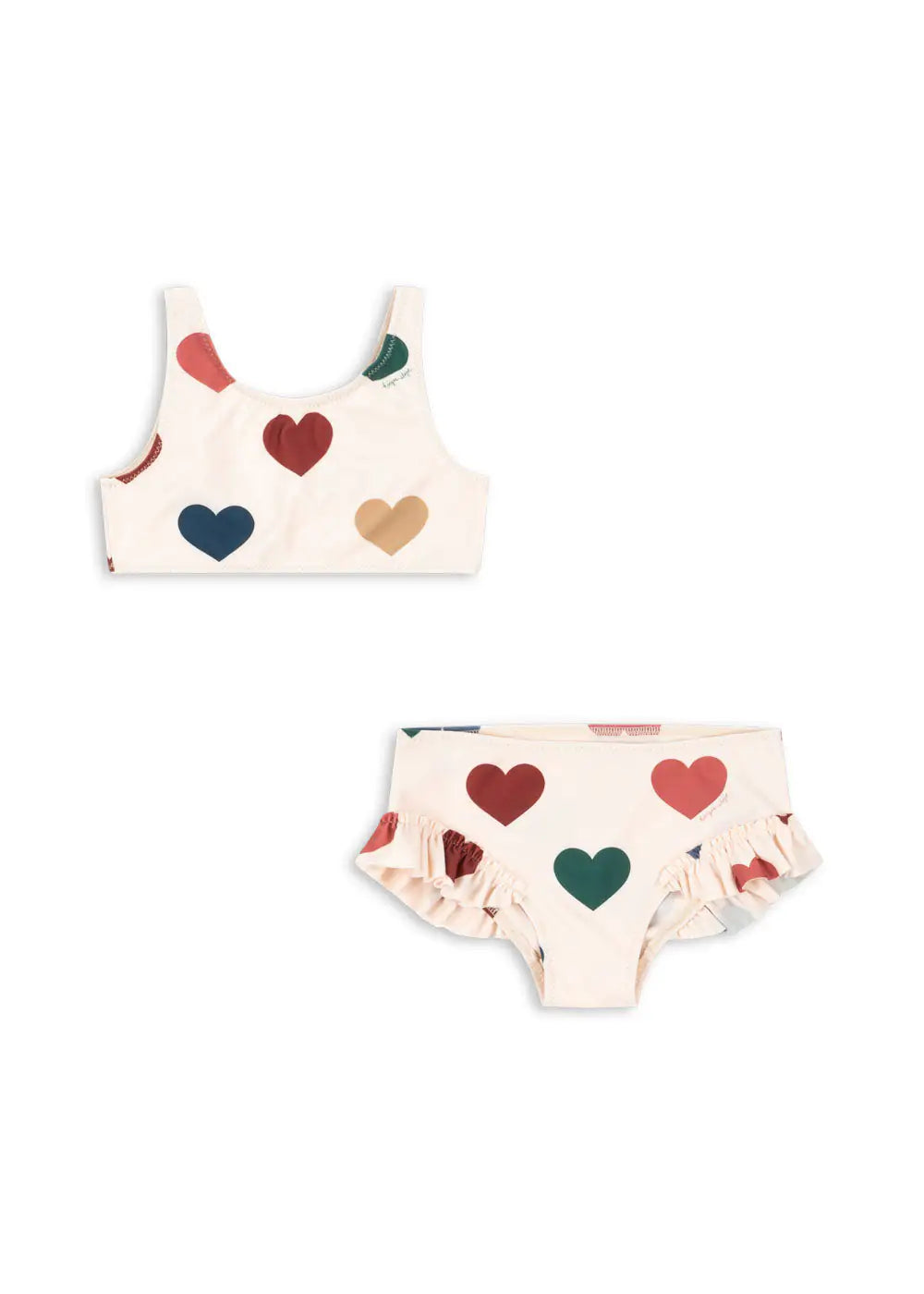 cremefarbener Bikini für Mädchen mit buntem Herz-Allover-Print und Rüschendetails an den Beinausschnitten. Produktbild, Ansicht vorne.