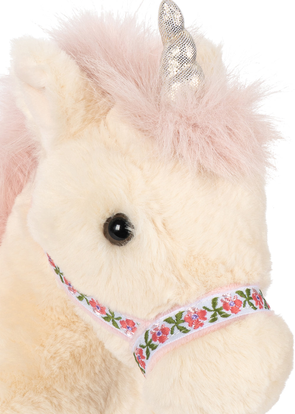 Konges Sloejd Starlight Unicorn off white Detailansicht Schnauze mit floralem Zaumzeug und silberfarbenes Horn. 