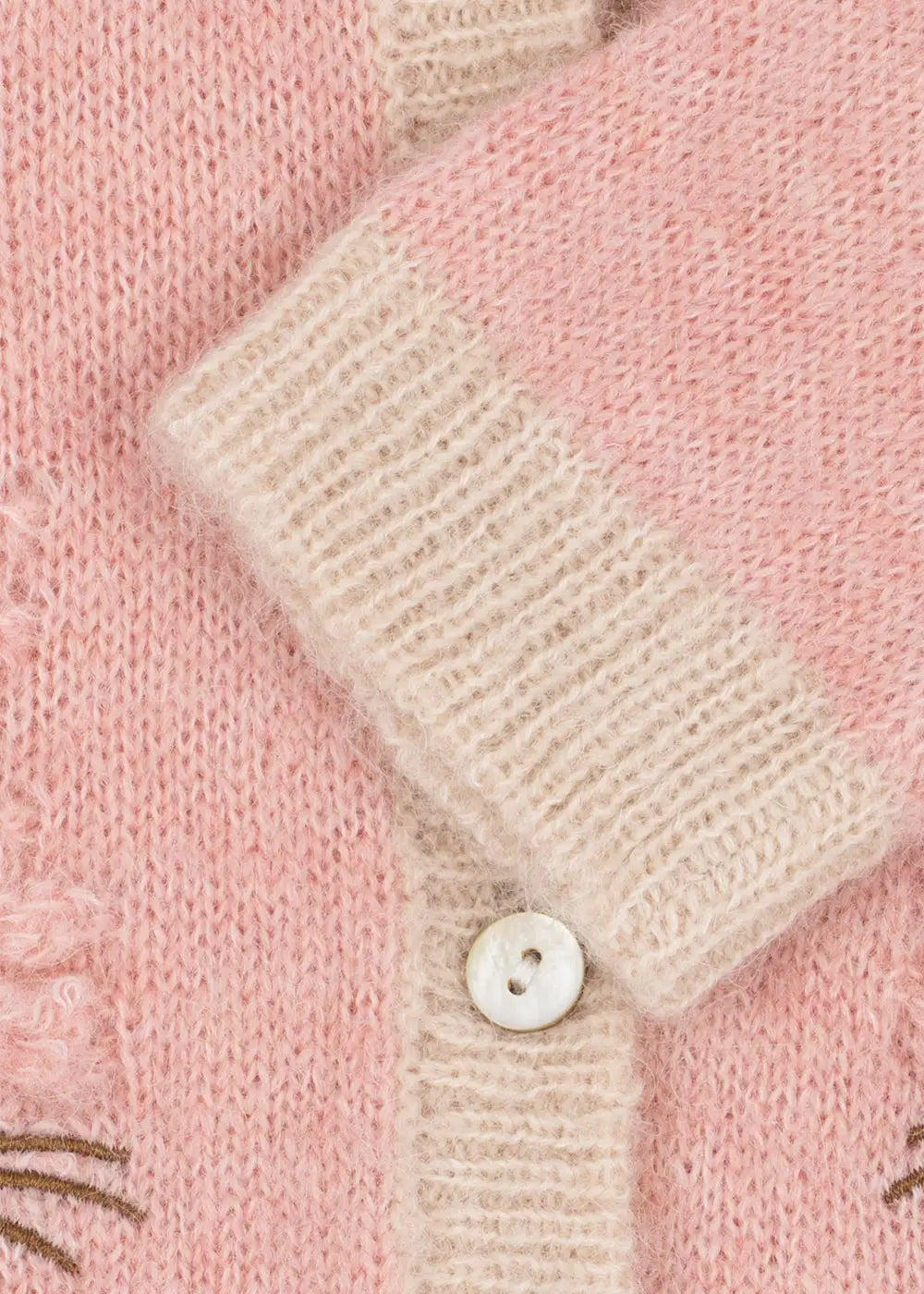Konges Slojd Kitty Cardigan silver pink Detailansicht Ärmelabschluss. 