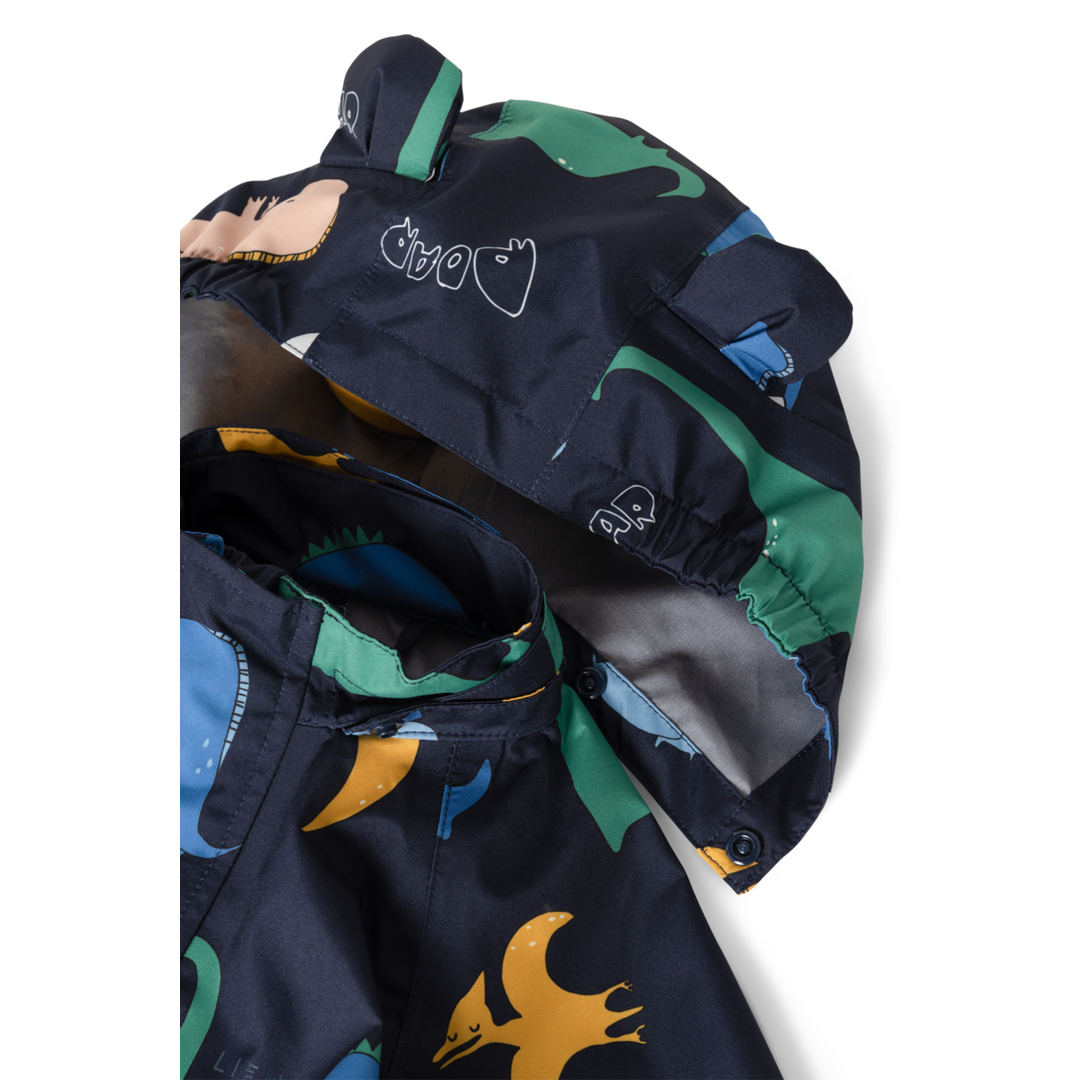 Liewood Manu Rainwear Set dino roar classic navy Detailansicht abnehmbare Kapuze mit Öhrchen und Dino-Muster