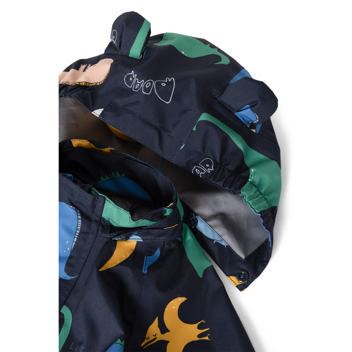 Liewood Manu Rainwear Set dino roar classic navy Detailansicht abnehmbare Kapuze mit Öhrchen und Dino-Muster