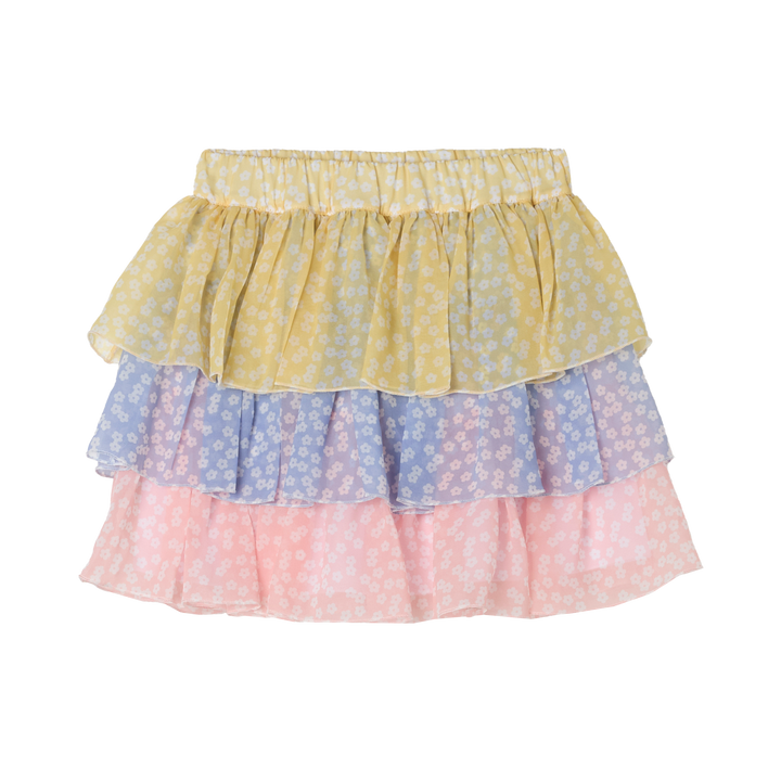 bunter Stufenrock für Mädchen aus Polyester mit einer gelben, blauen und rosafarbenen Stufe mit weißen Blümchen und Gummibund. Unterrock aus 100% Baumwolle. Produktbild