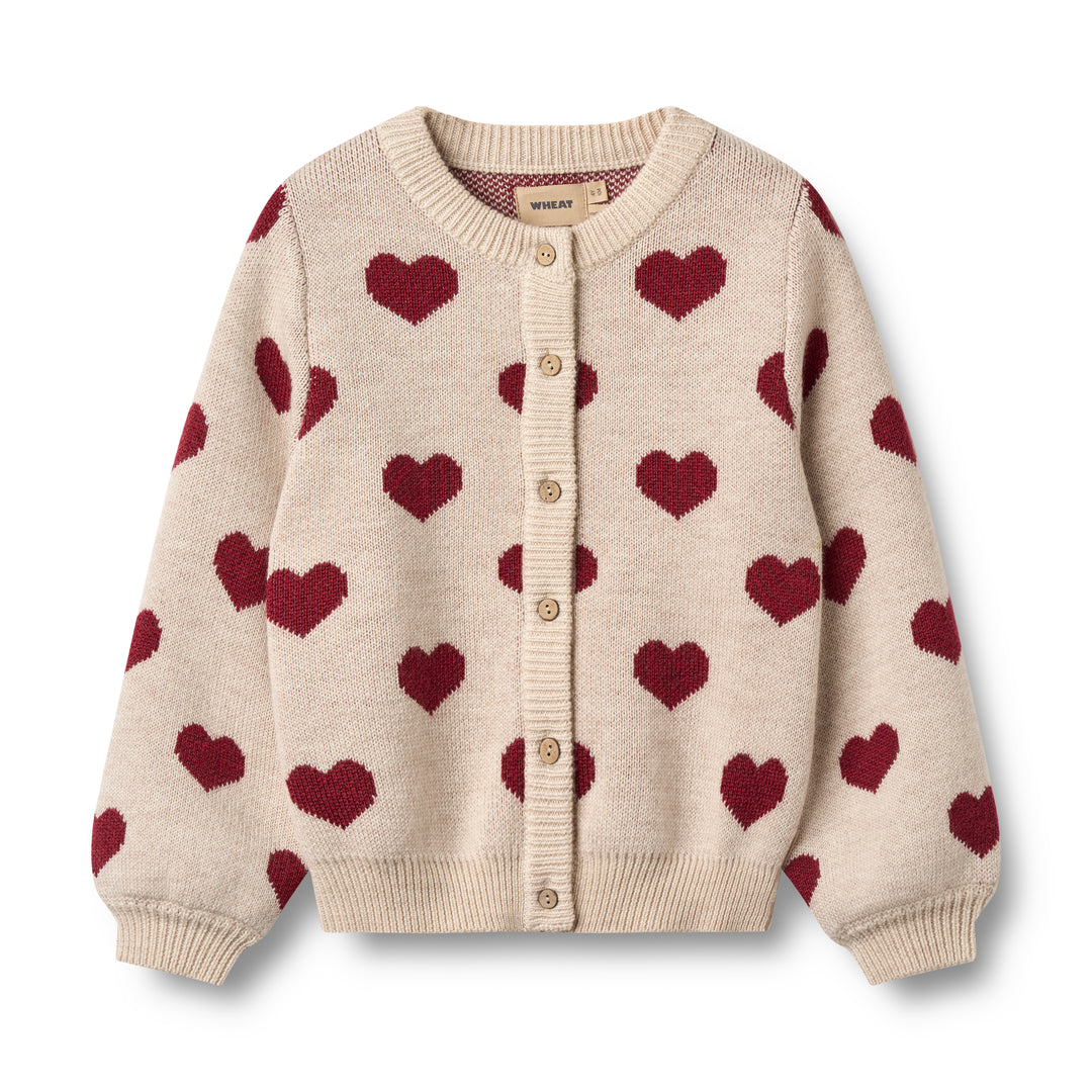 cremefarbene Strickjacke für Mädchen aus Merinowolle mit Knopfleiste und rotem Herzmuster