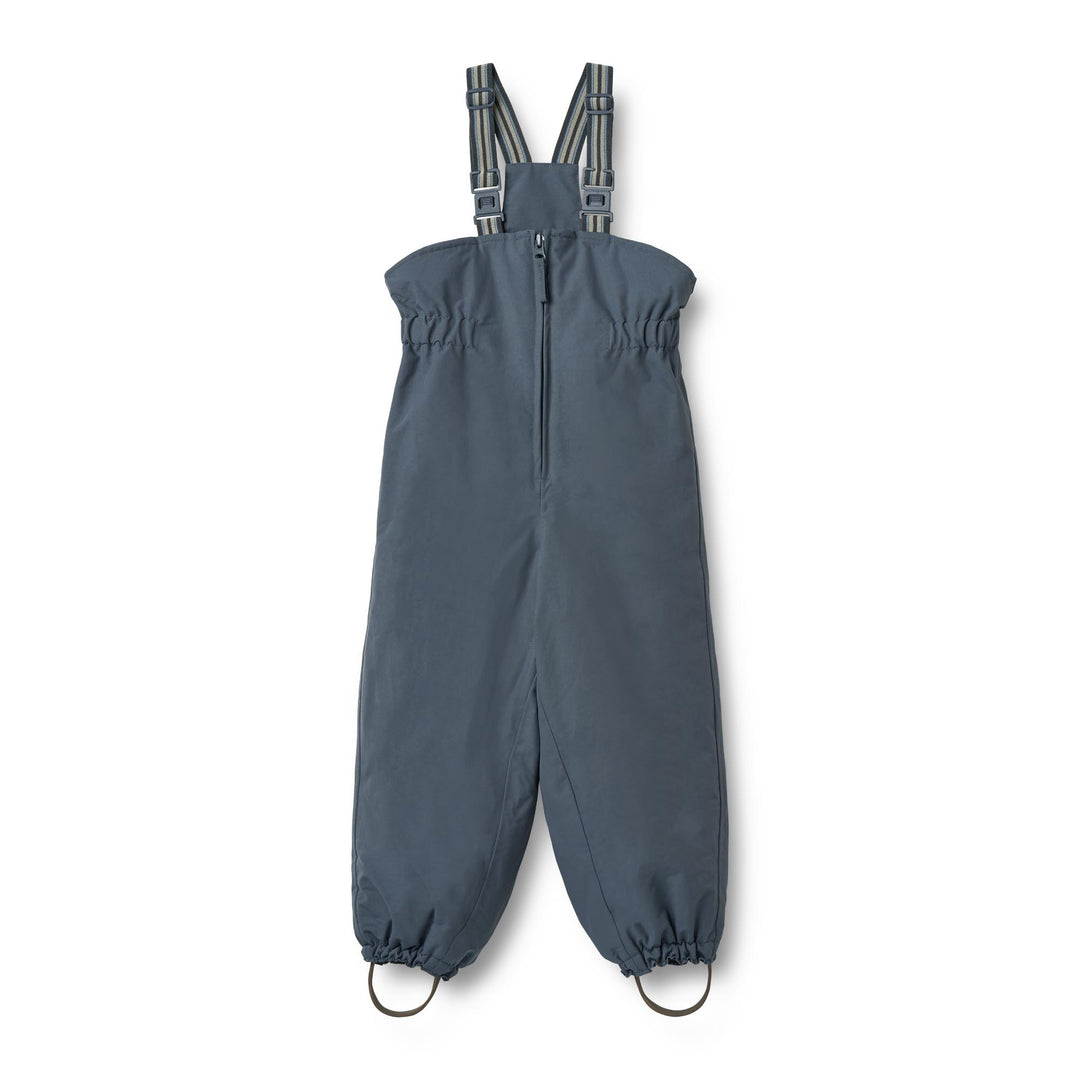 gefütterte Skihose Schneehose für Kinder aus recyceltem Nylon in dunkelblau mit Reißverschluss, verstellbaren Hosenträgern und Schlaufen an den Füßen