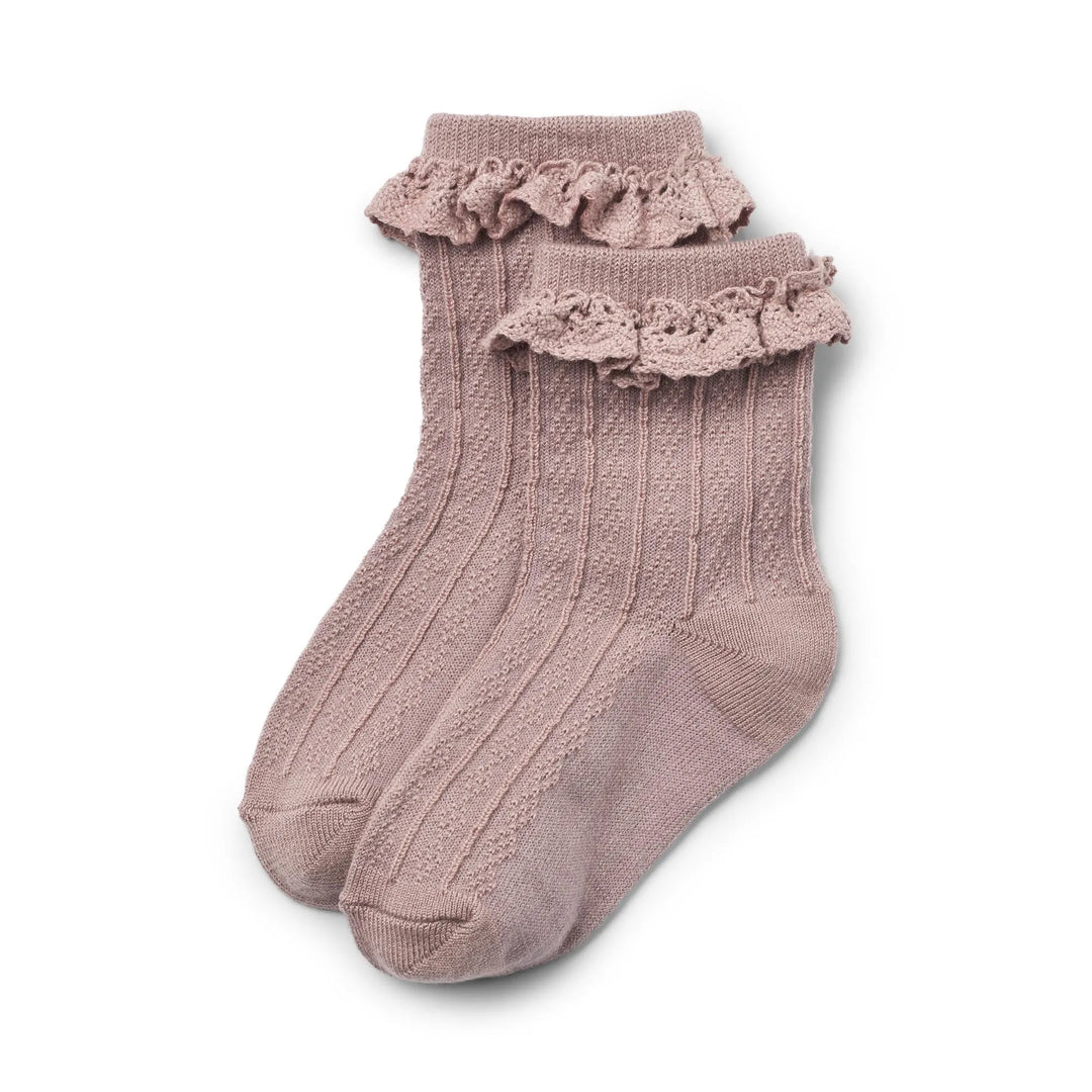 rosafarbene Socken für Mädchen aus Wolle mit Spitzendetails am Saum