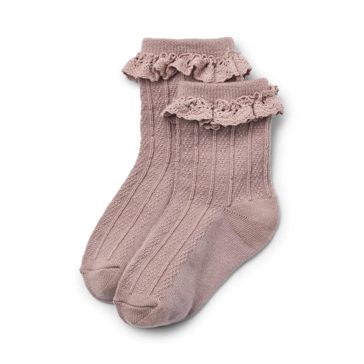 rosafarbene Socken für Mädchen aus Wolle mit Spitzendetails am Saum