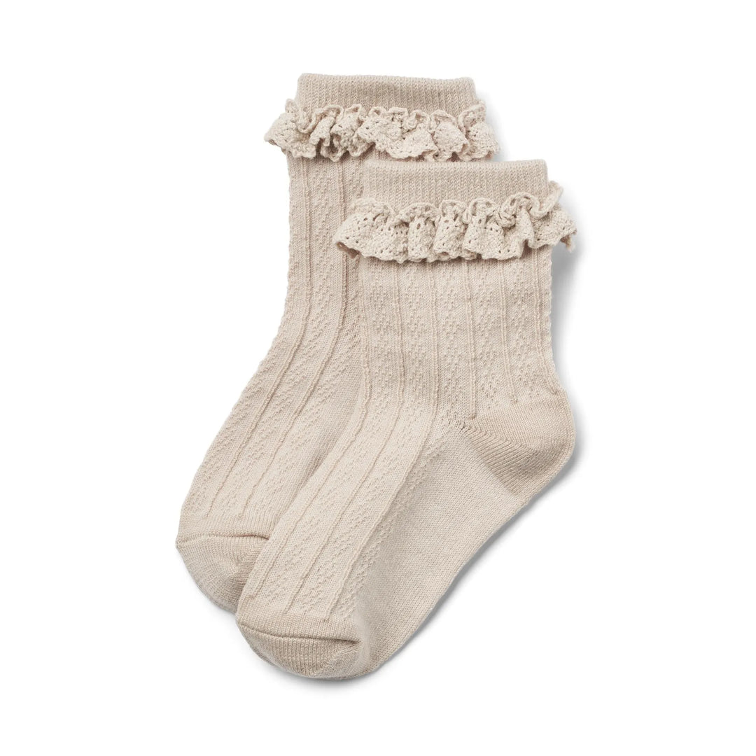 cremefarbene Socken für Mädchen aus Wolle mit Rüschendetails am Saum