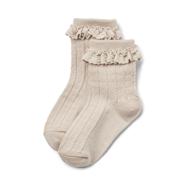 cremefarbene Socken für Mädchen aus Wolle mit Rüschendetails am Saum
